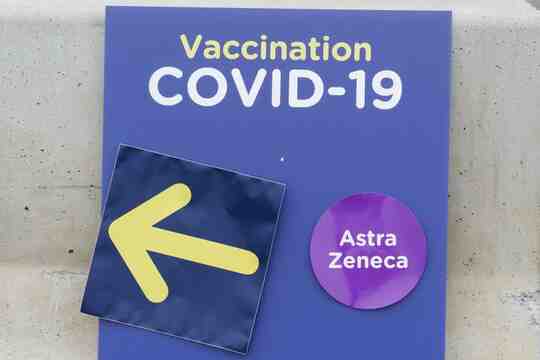 A sign for AstraZeneca at a vaccination clinic
