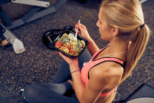 Carbs and protein after a workout can help with recovery.  (whether you should eat before or after a workout depends on your fitness goals)