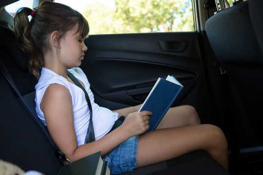 Why Does Reading In The Back Seat Make You Feel Sick?