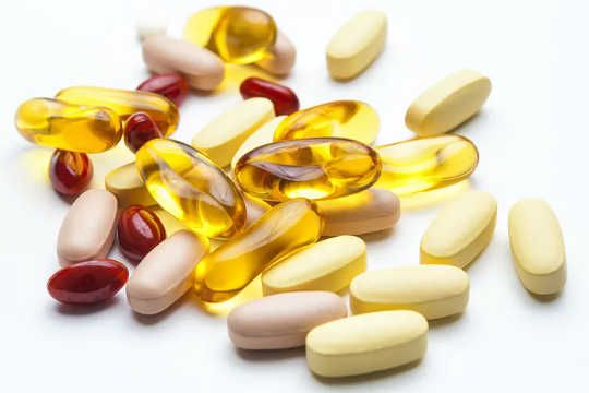 A variety of vitamin tablets and capsules.