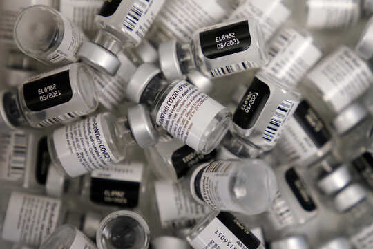 Empty vials of Pfizer's COVID-19 vaccine